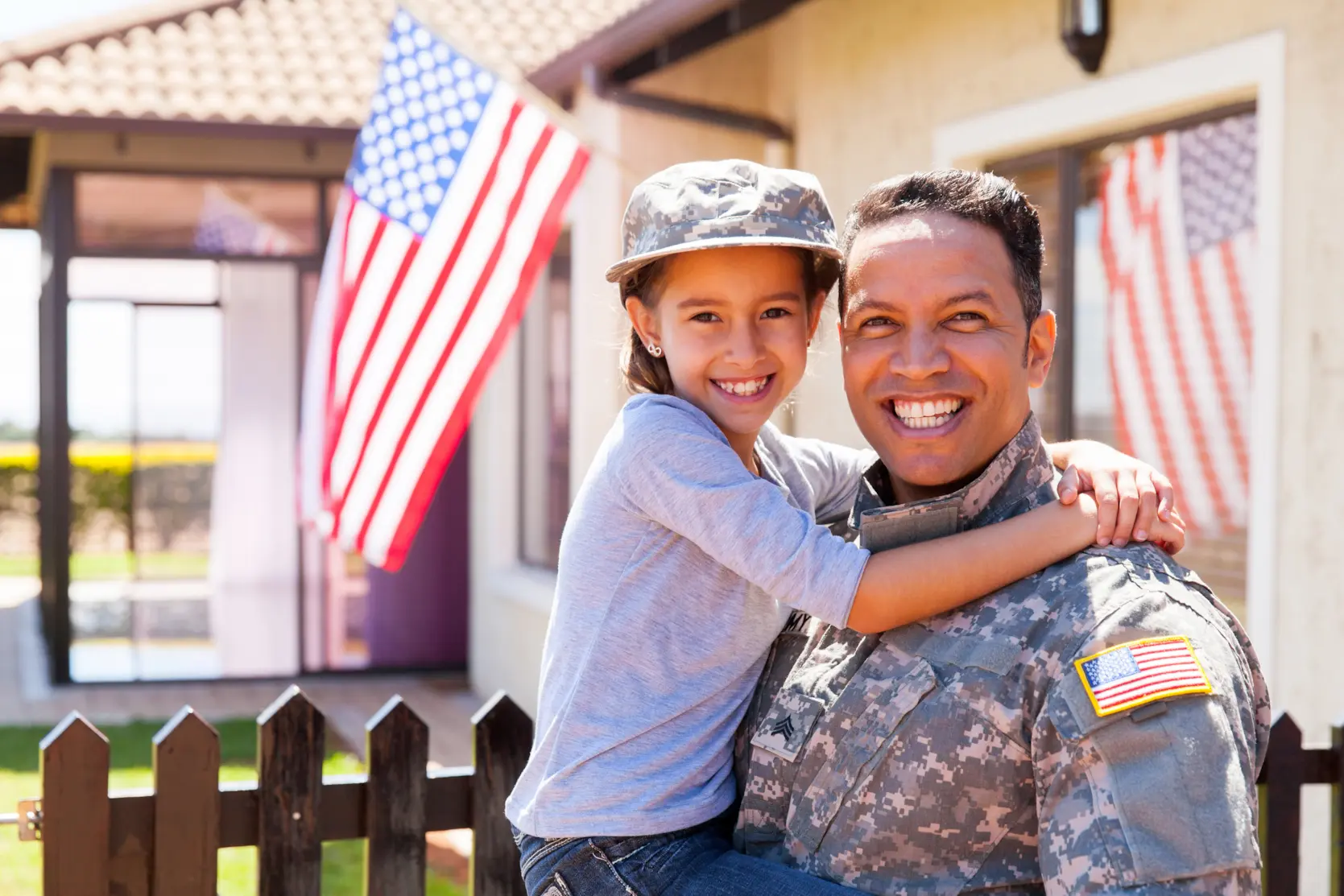 Smiling Soldier with Daughter